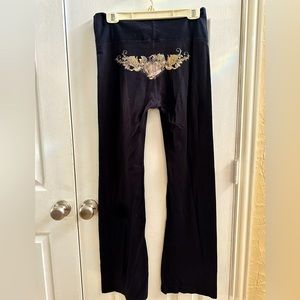 Ladies Black T-Party Size Large Leggings with Print on Back.